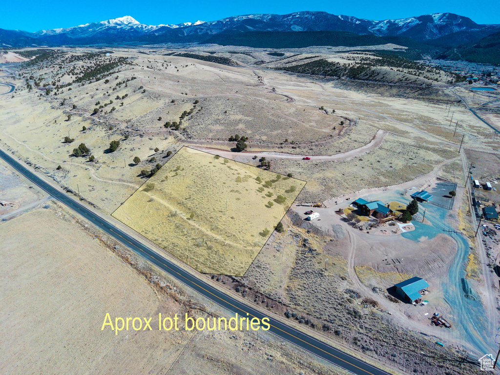 Aerial view with a mountain view and a rural view
