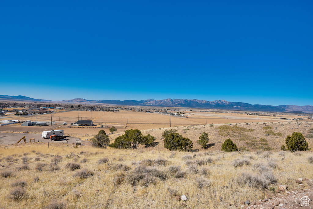 View of mountain feature with a desert view and a rural view