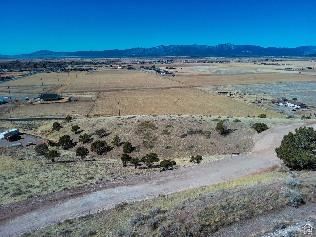 Drone / aerial view with a mountain view and a rural view