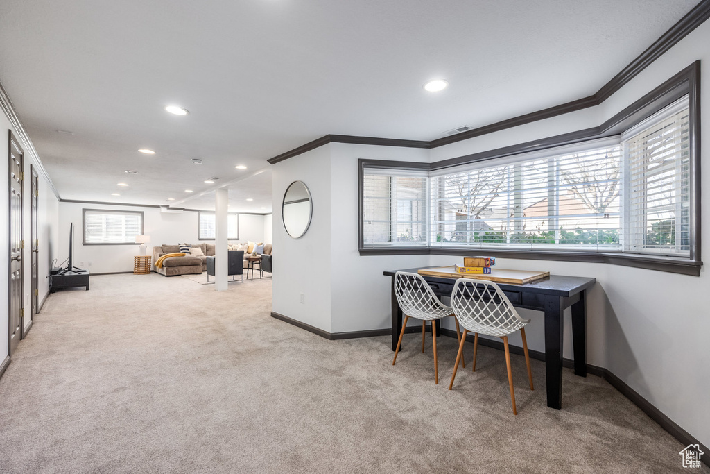 Office with ornamental molding, recessed lighting, carpet floors, baseboards, and healthy amount of natural light