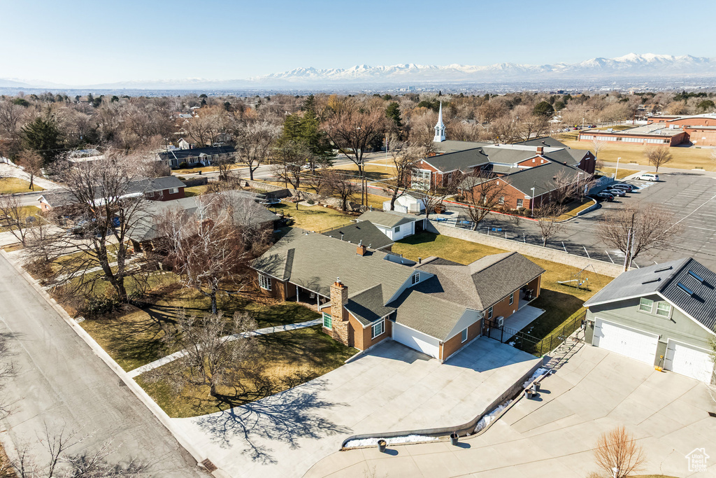 Aerial view of residential area with mountains