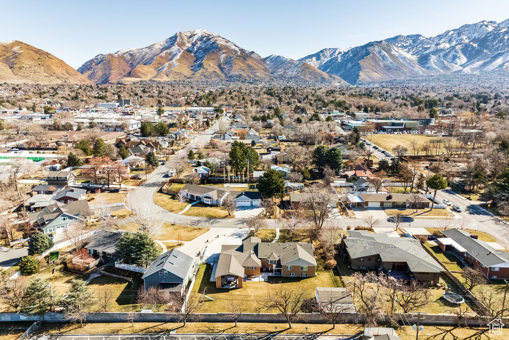 View of mountain backdrop with nearby suburban area