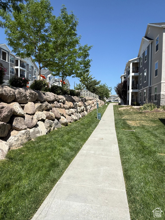 View of community with a lawn and a residential view