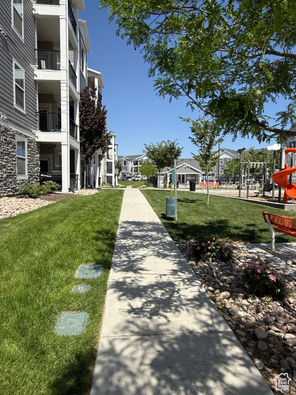 View of property\\\'s community with a lawn