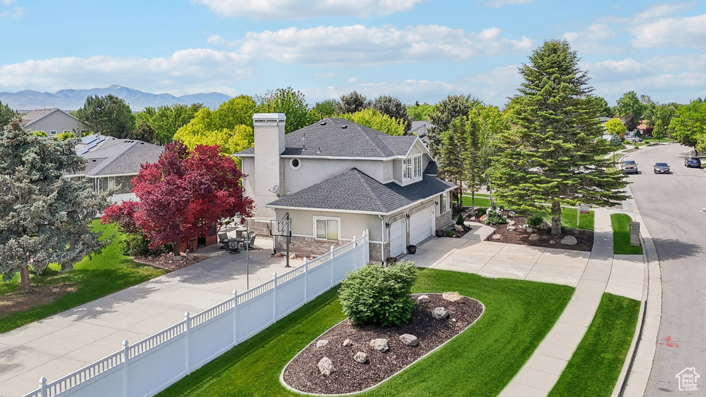 View of subject property with mountains