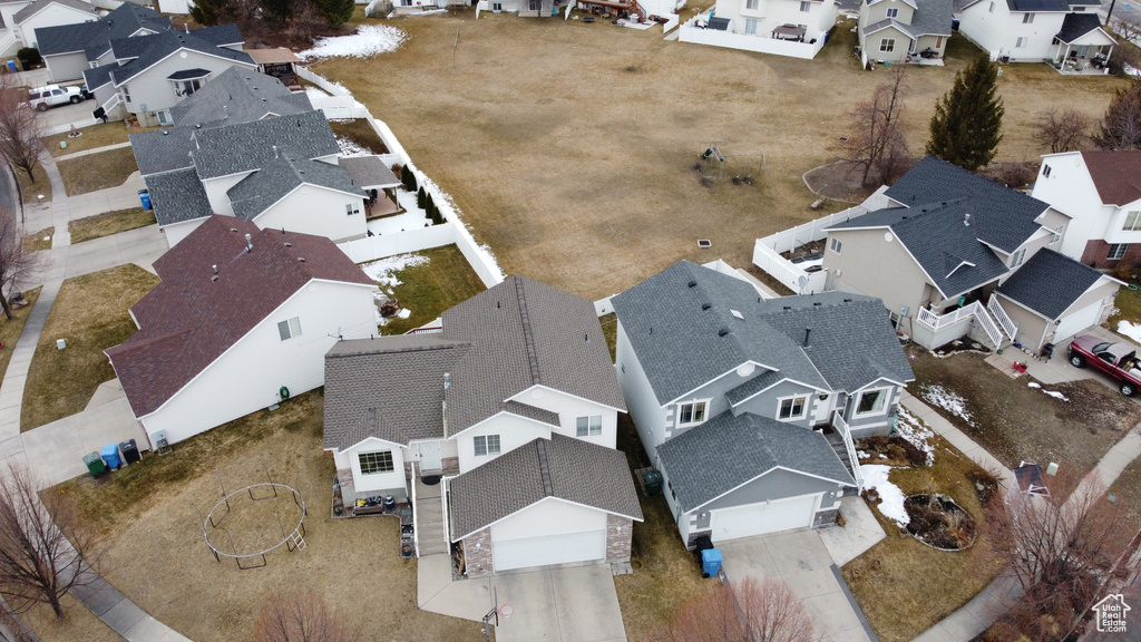 Birds eye view of property with a residential view