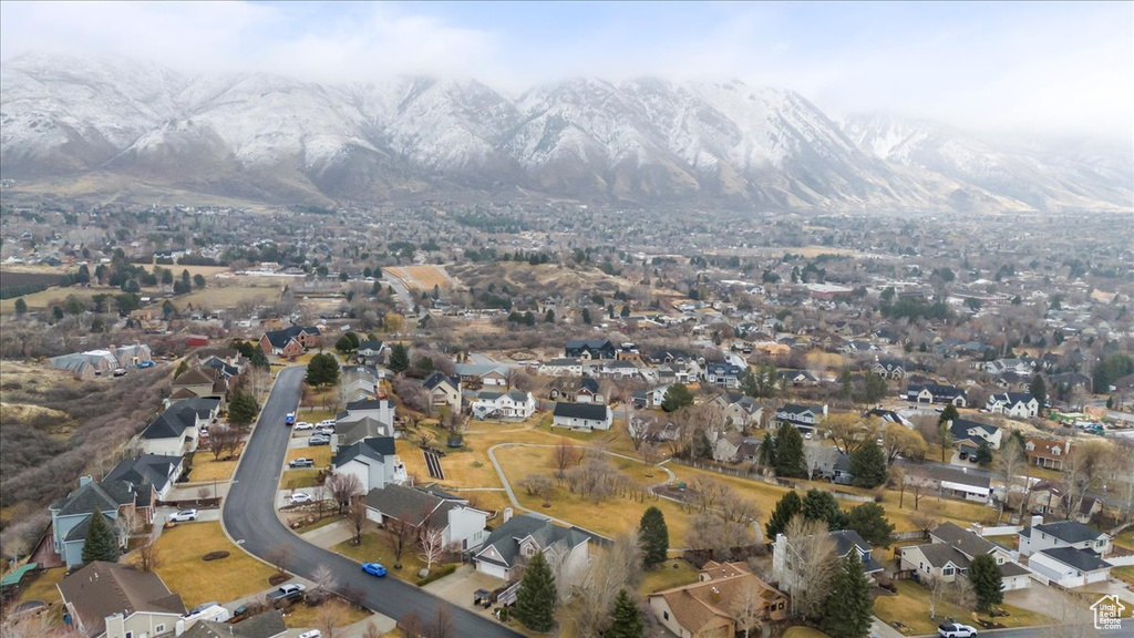 Drone / aerial view featuring a mountain view and a residential view