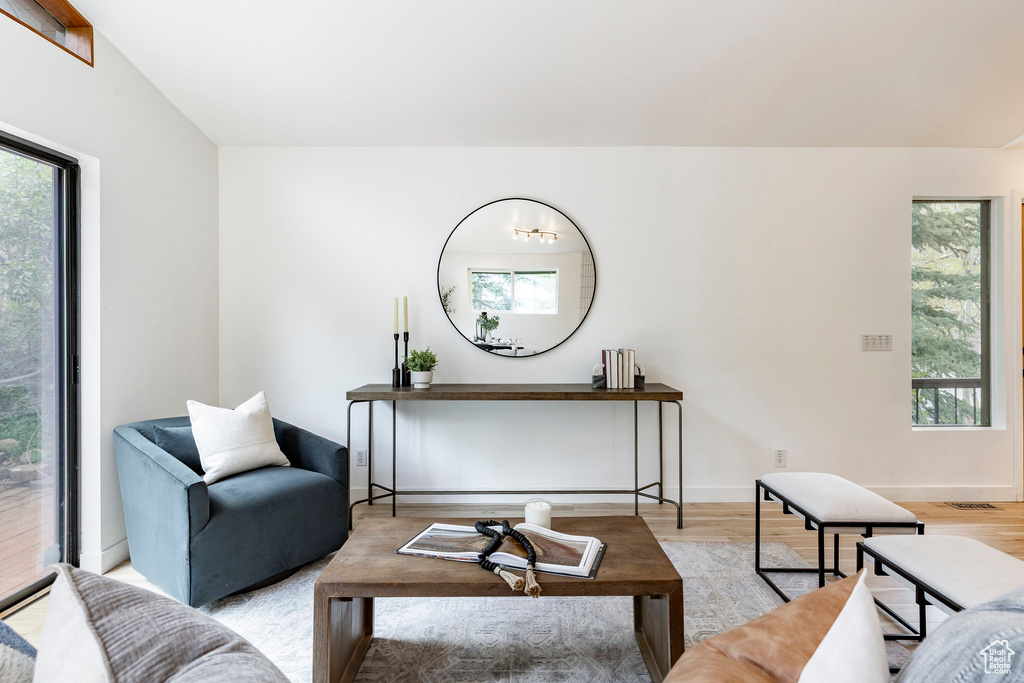 Living room featuring wood finished floors and baseboards
