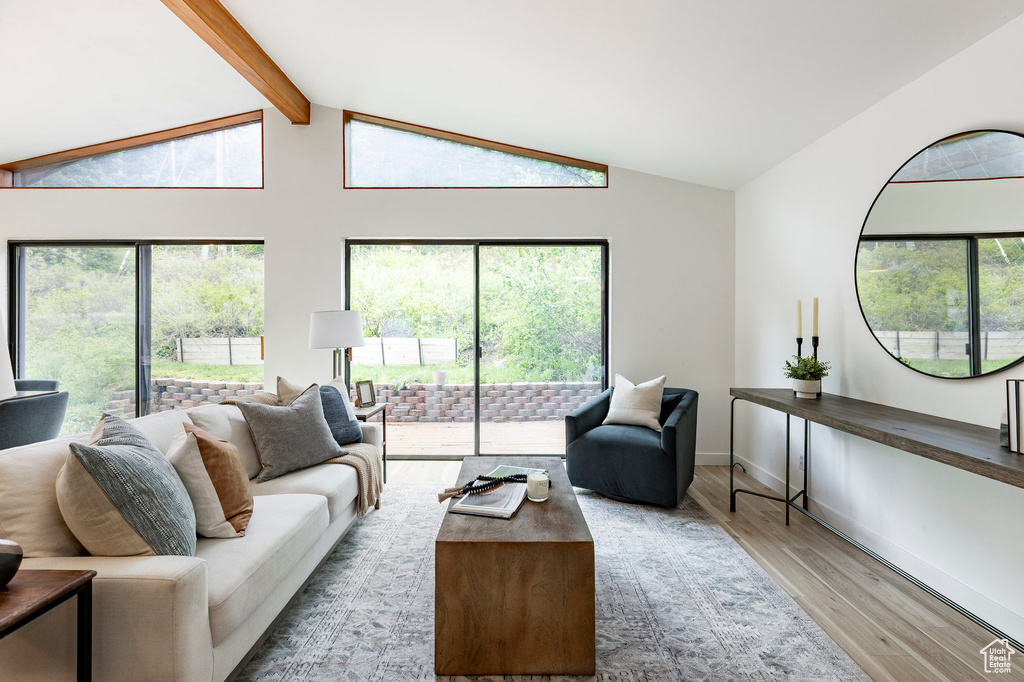 Living room featuring wood finished floors and baseboards