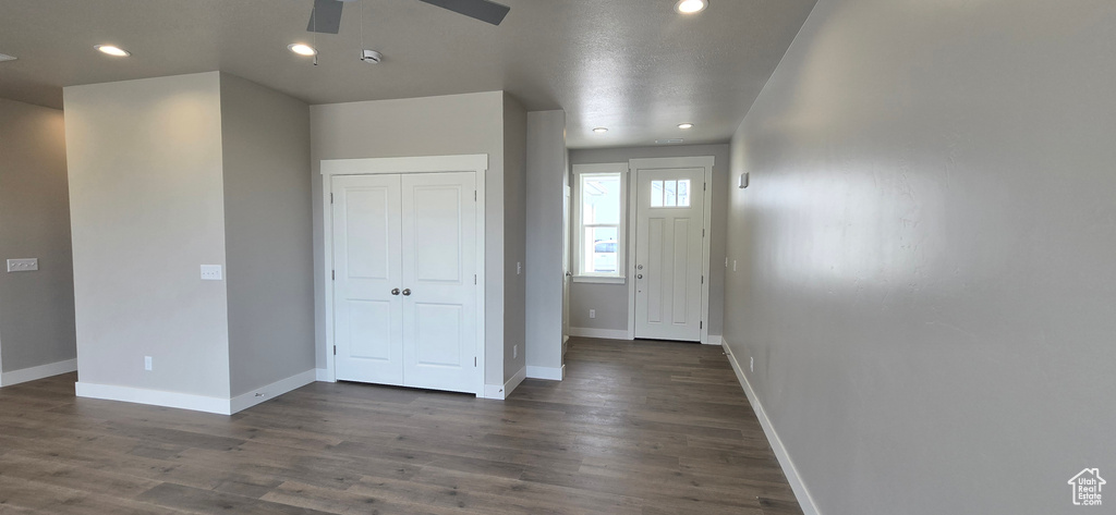 Foyer with baseboards, recessed lighting, ceiling fan, and dark wood-style flooring