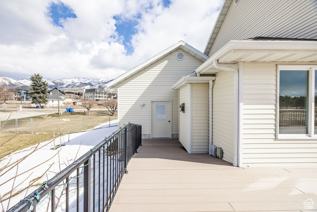 Wooden terrace with a mountain view and fence