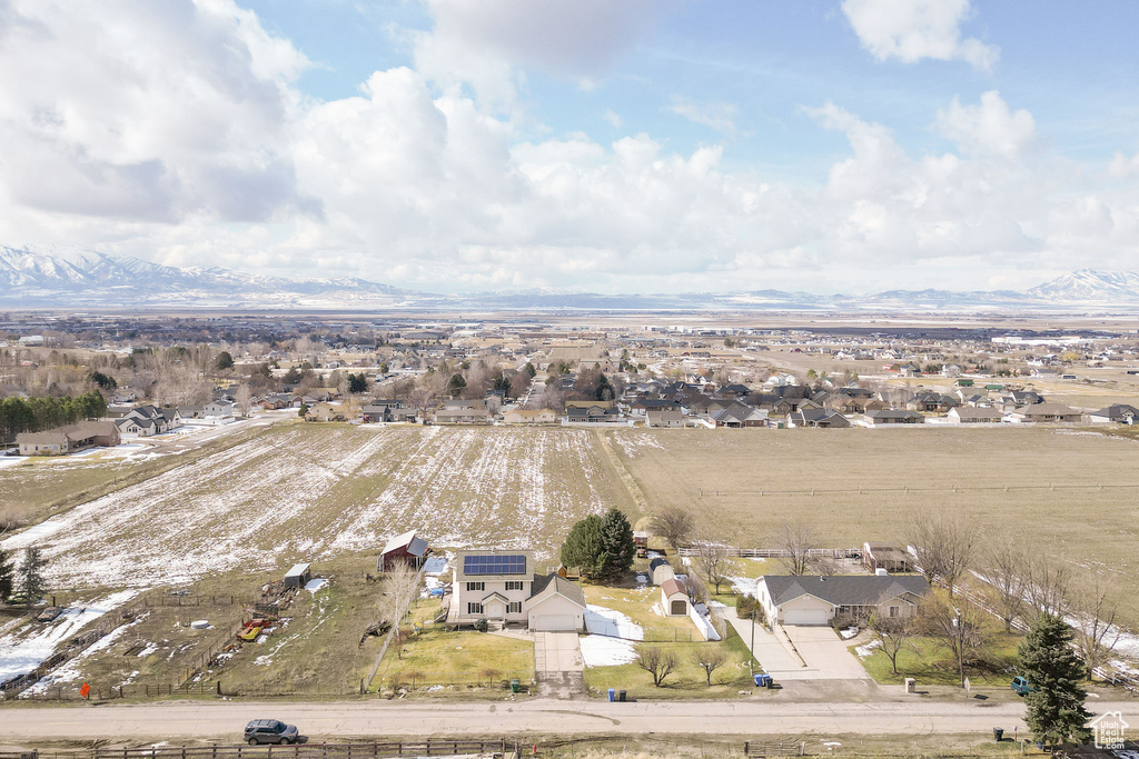 Drone / aerial view with a residential view and a mountain view