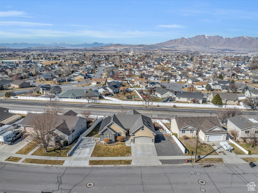 Drone / aerial view featuring a residential view and a mountain view