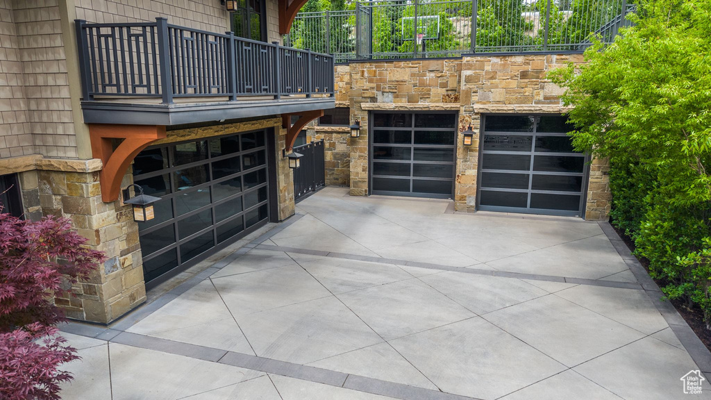Garage featuring driveway