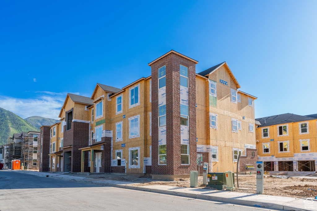 View of building exterior with a mountain view