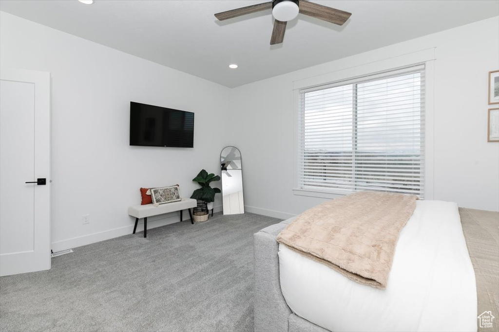 Bedroom with carpet floors, recessed lighting, ceiling fan, and baseboards