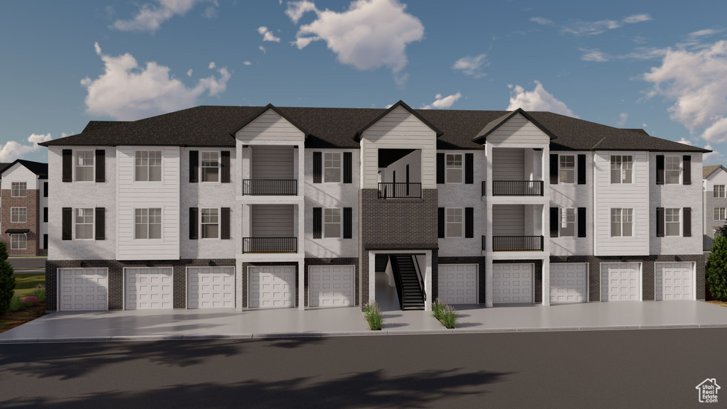 Townhome / multi-family property with an attached garage