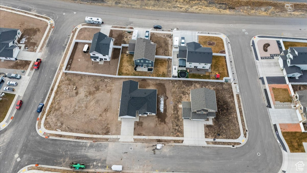 Birds eye view of property with a residential view