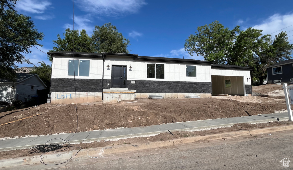 View of front of home featuring stone siding