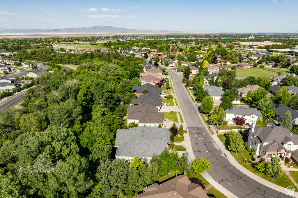 Aerial view of residential area featuring mountains