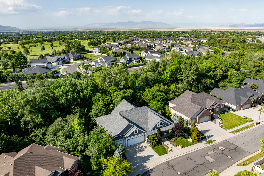 Aerial view of residential area featuring mountains