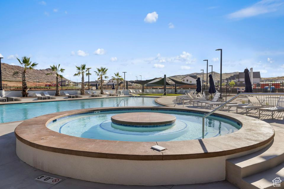 View of swimming pool with fence