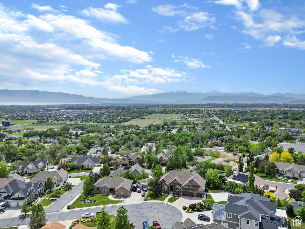 Drone / aerial view with a residential view and a mountain view