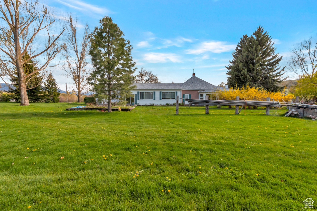 View of yard with fence