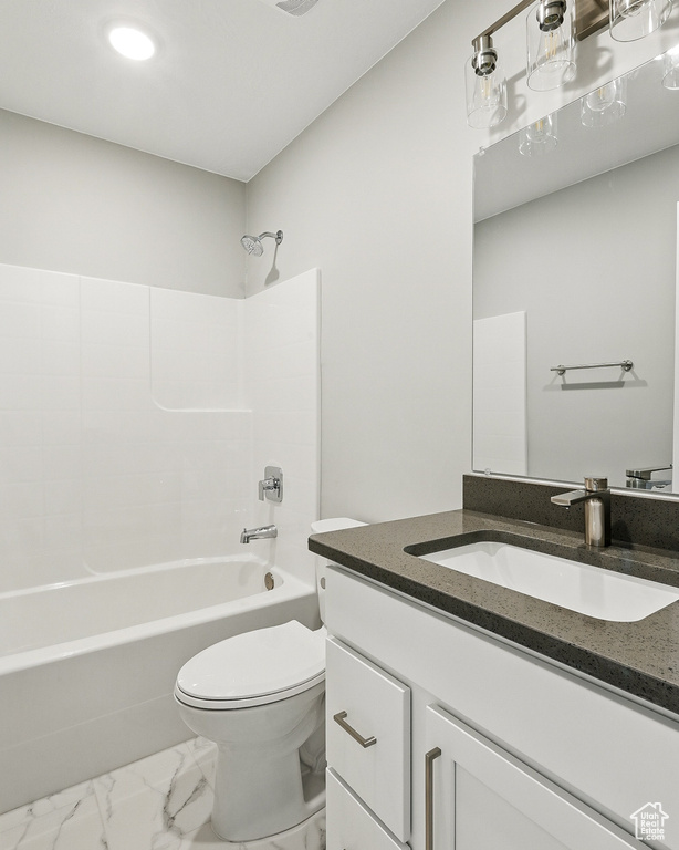 Full bath with vanity, shower / bathtub combination, toilet, marble finish floor, and recessed lighting