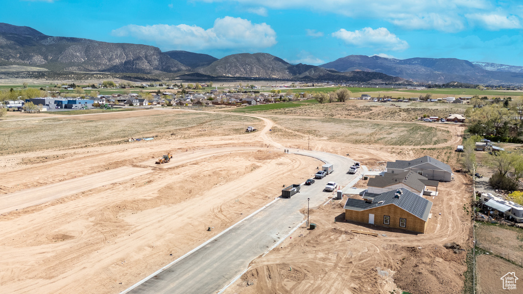 Birds eye view of property featuring a mountain view and a rural view