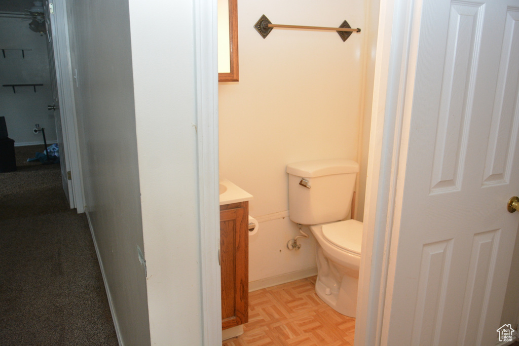 Bathroom featuring toilet and vanity