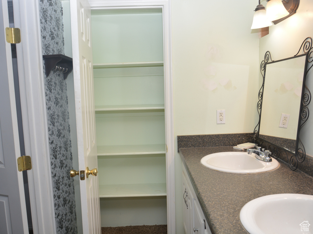 Bathroom with a sink and double vanity