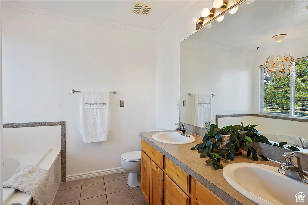 Full bath featuring crown molding, visible vents, a sink, and tile patterned floors