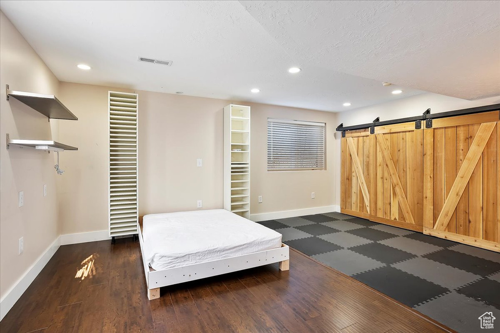 Unfurnished bedroom with recessed lighting, visible vents, and baseboards