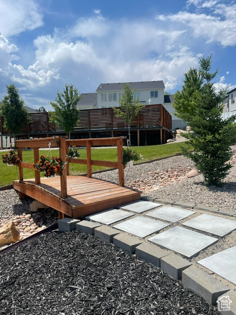 Wooden terrace with a yard