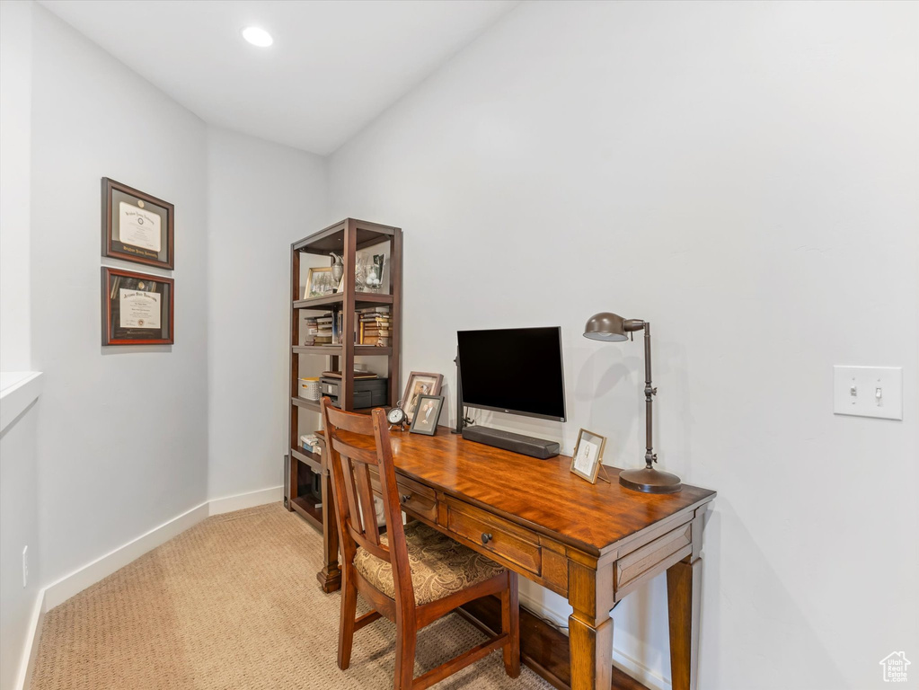 Office area featuring recessed lighting, light carpet, and baseboards