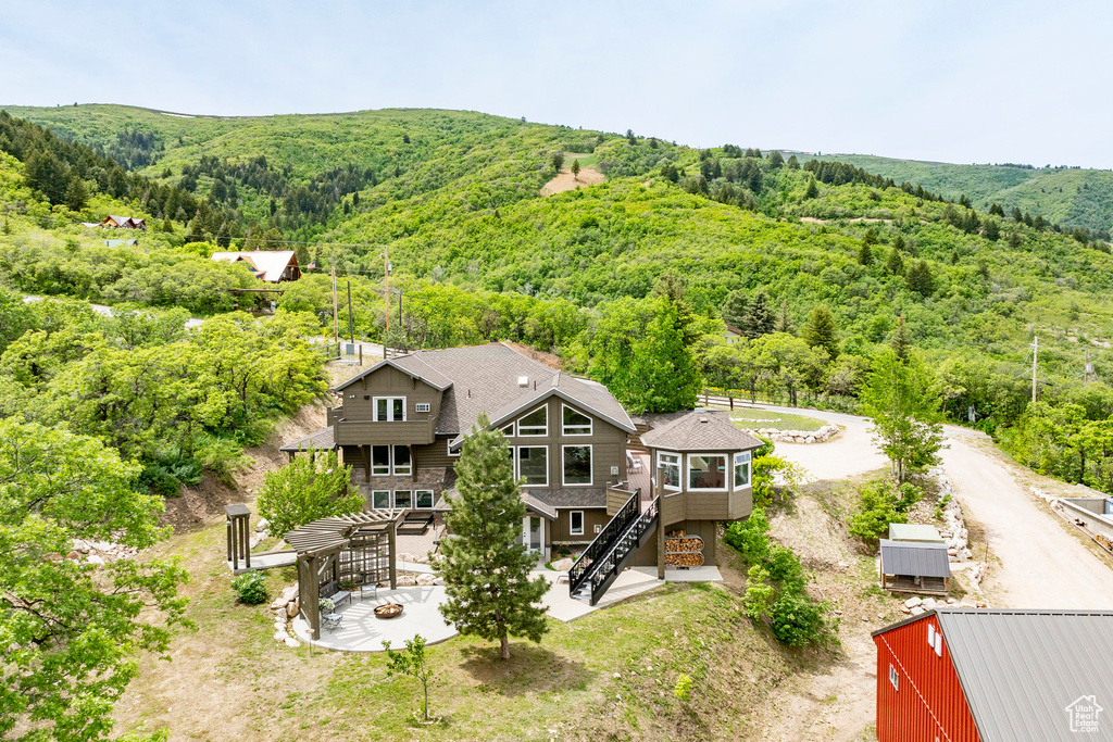 View from above of property featuring a forest