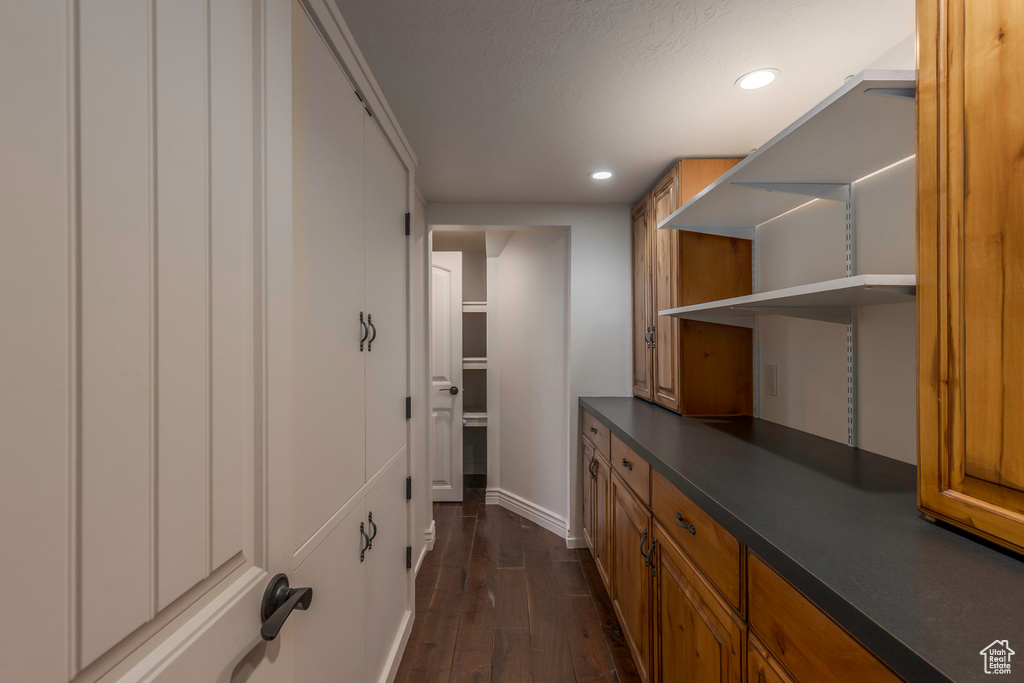 Interior space featuring dark wood-style flooring