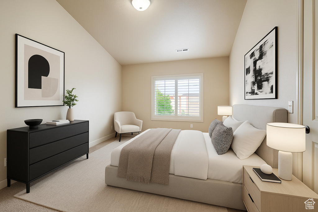 Carpeted bedroom featuring lofted ceiling and baseboards