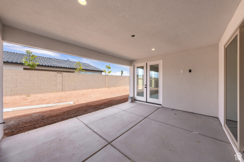 View of patio featuring french doors