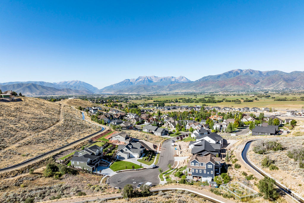 Drone / aerial view featuring a residential view and a mountain view