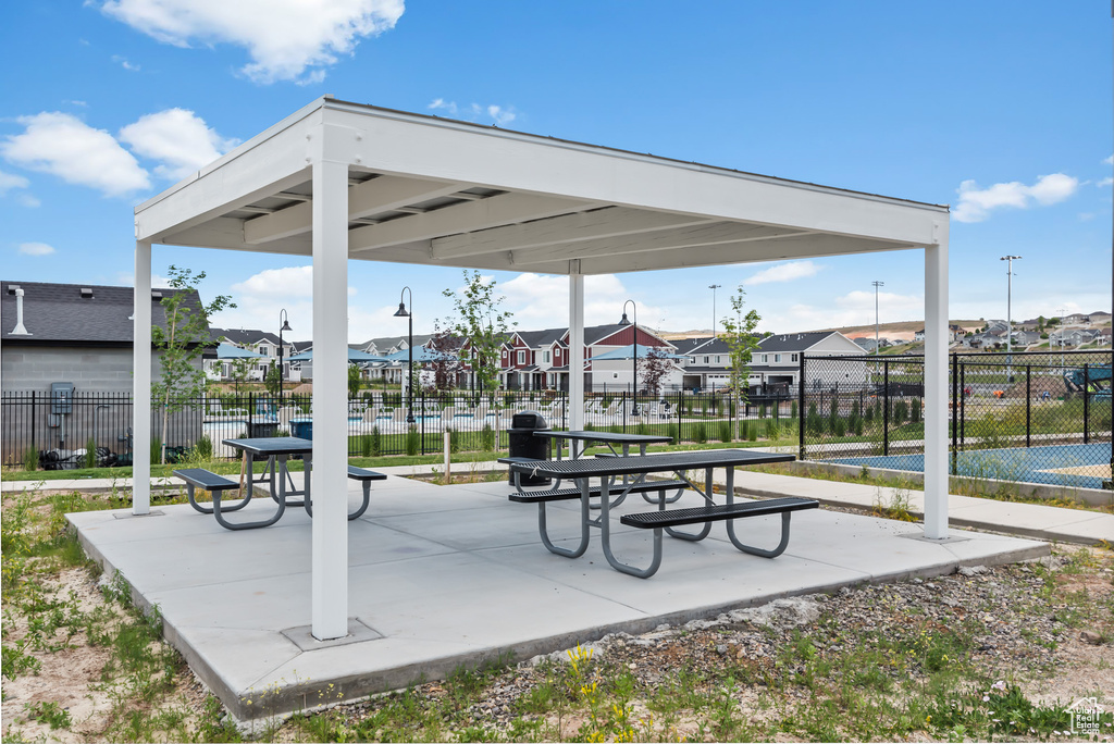 Surrounding community with a residential view and fence