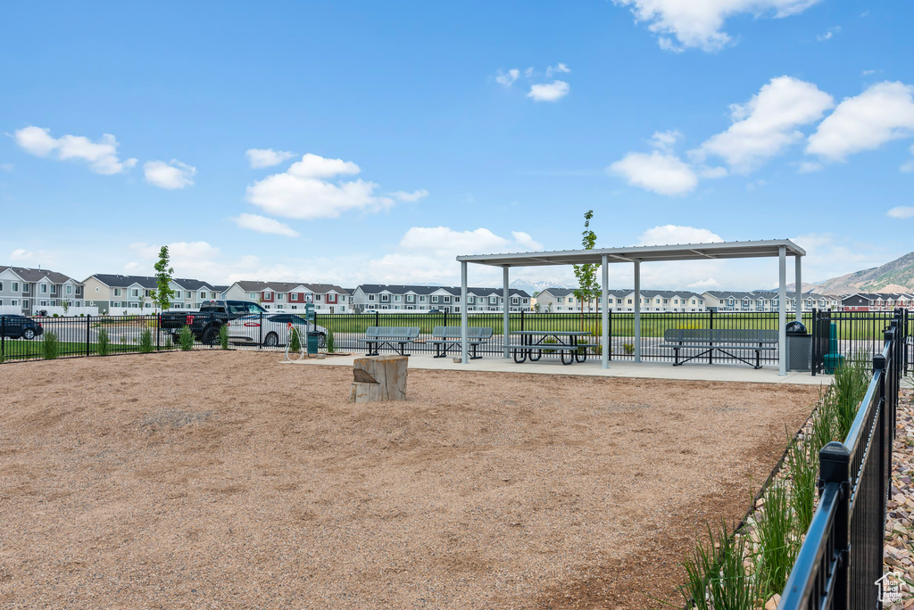 View of home\'s community featuring a residential view and fence