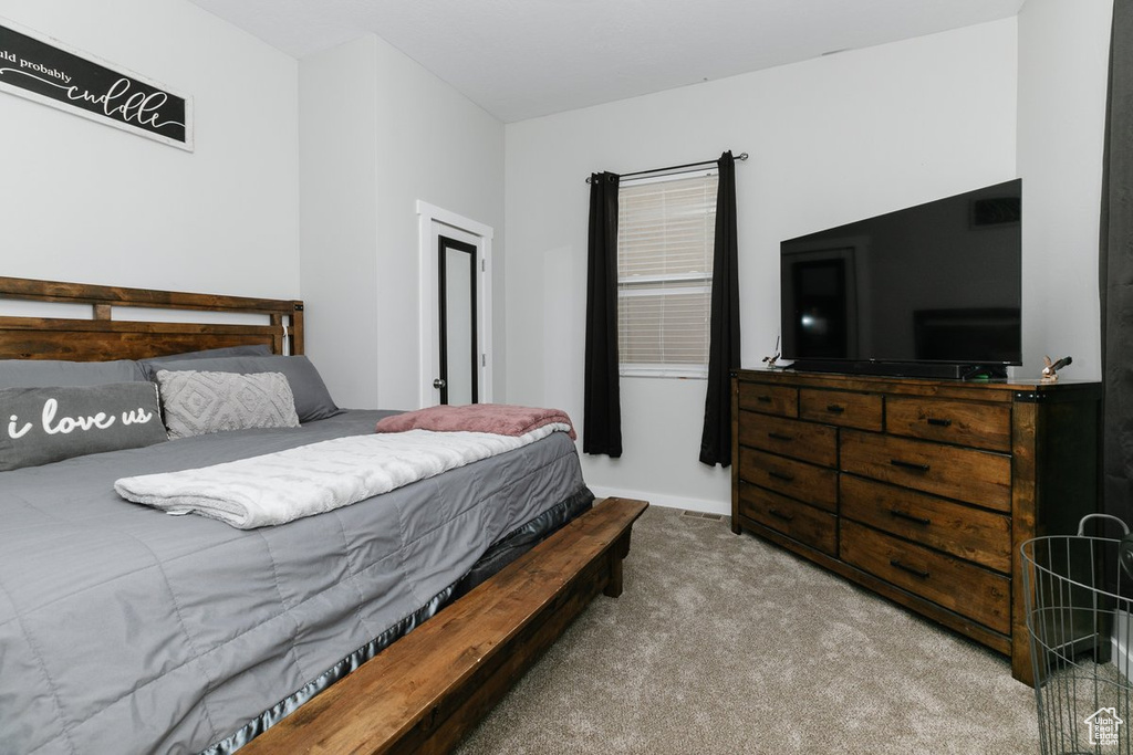 View of carpeted bedroom