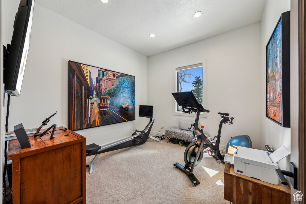 Exercise area with carpet and recessed lighting