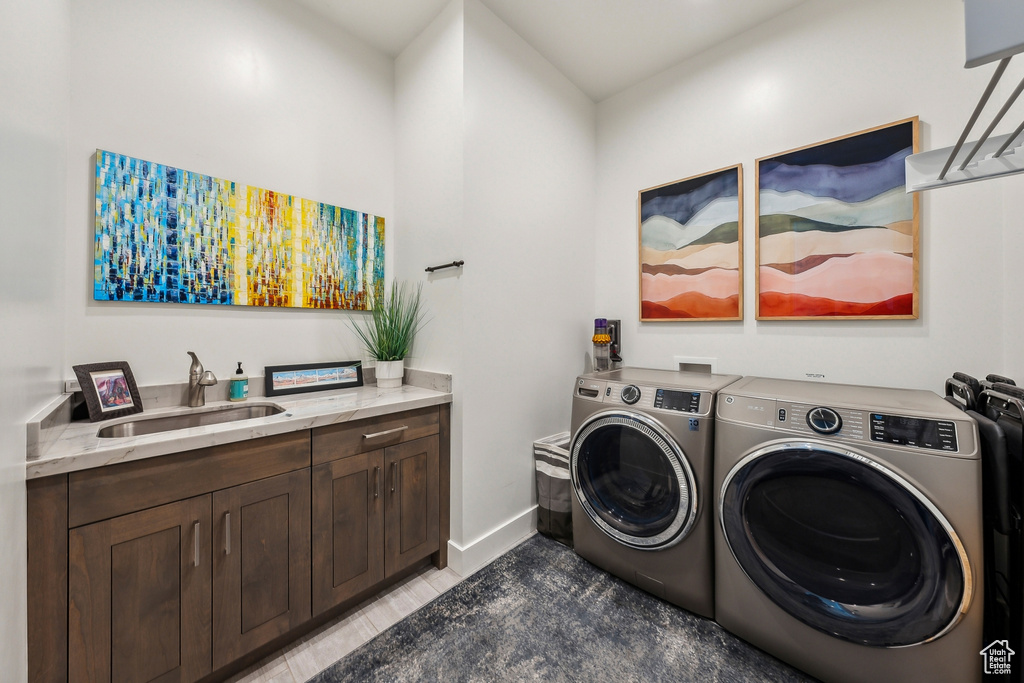 Washroom with separate washer and dryer and cabinet space