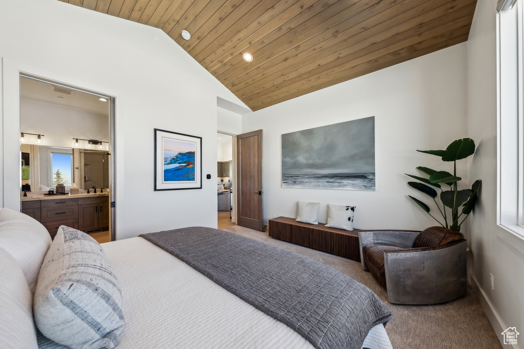 Carpeted bedroom with lofted ceiling, wooden ceiling, ensuite bathroom, and recessed lighting