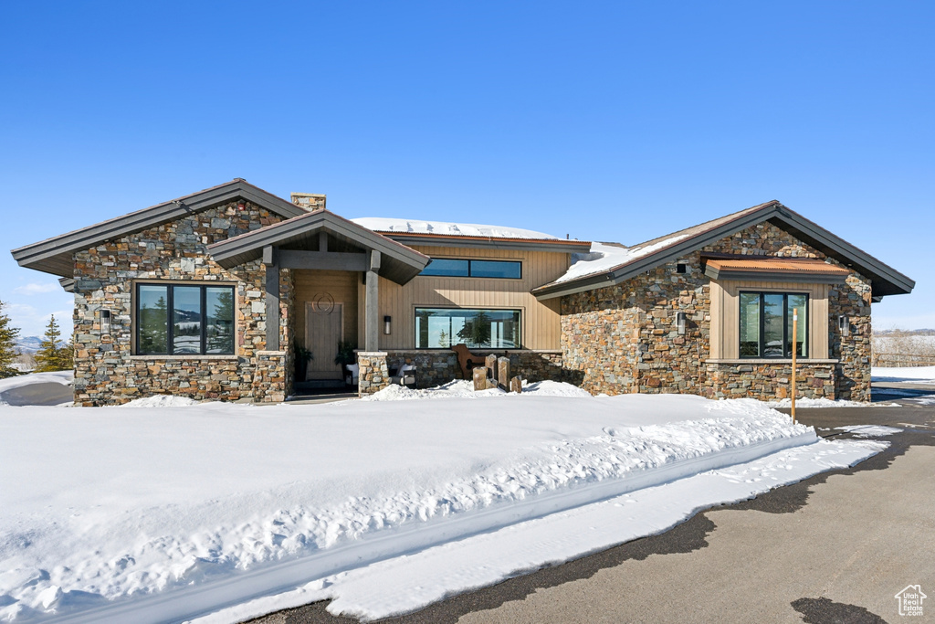 View of front of home with stone siding