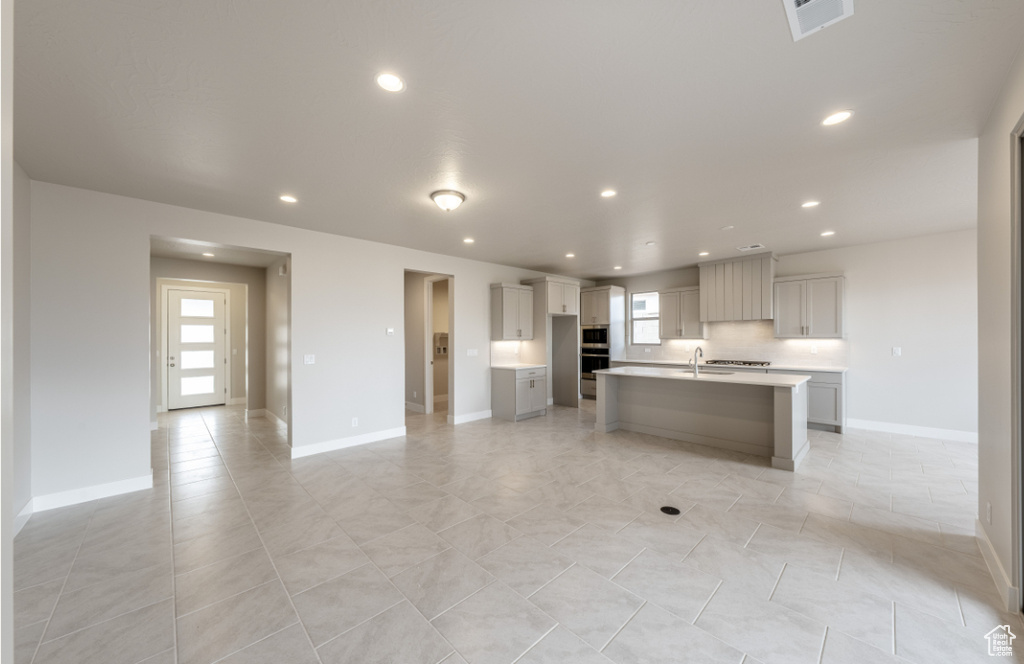 Kitchen with visible vents, recessed lighting, and plenty of natural light