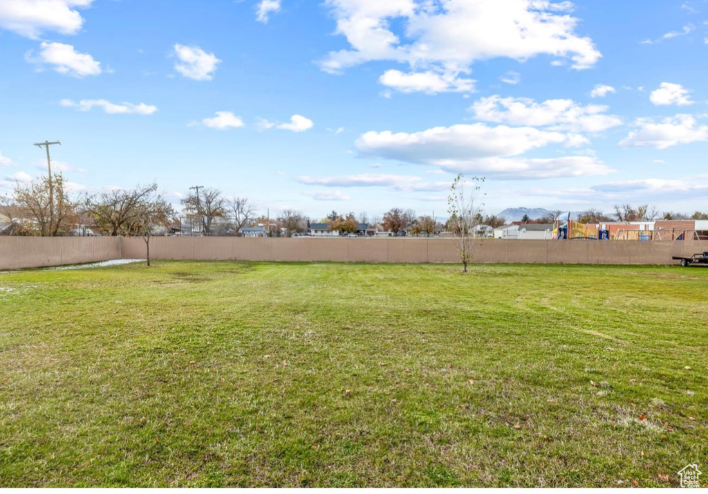 View of yard with fence